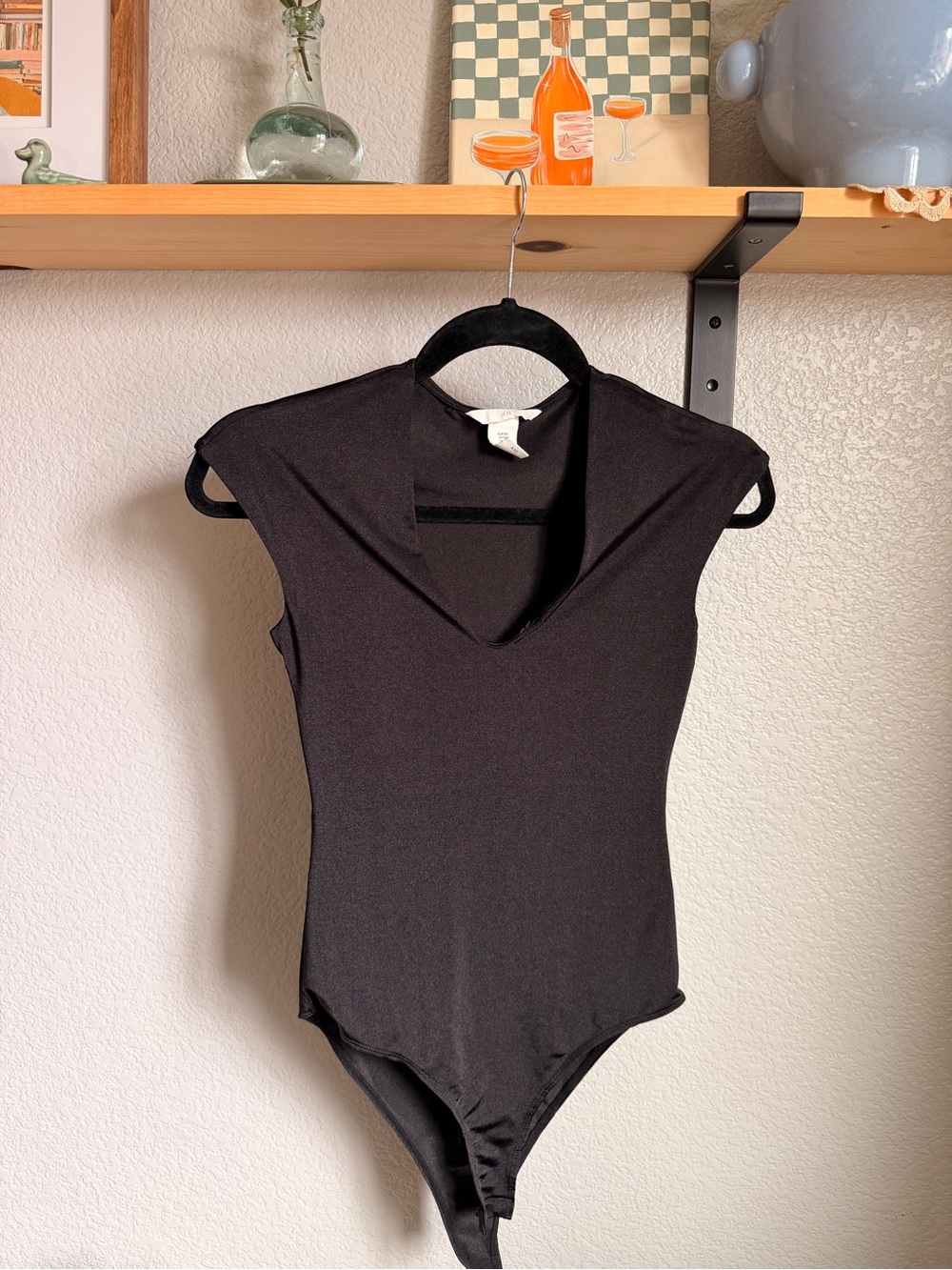 H&M Black Sleeveless One-Piece Bodysuit